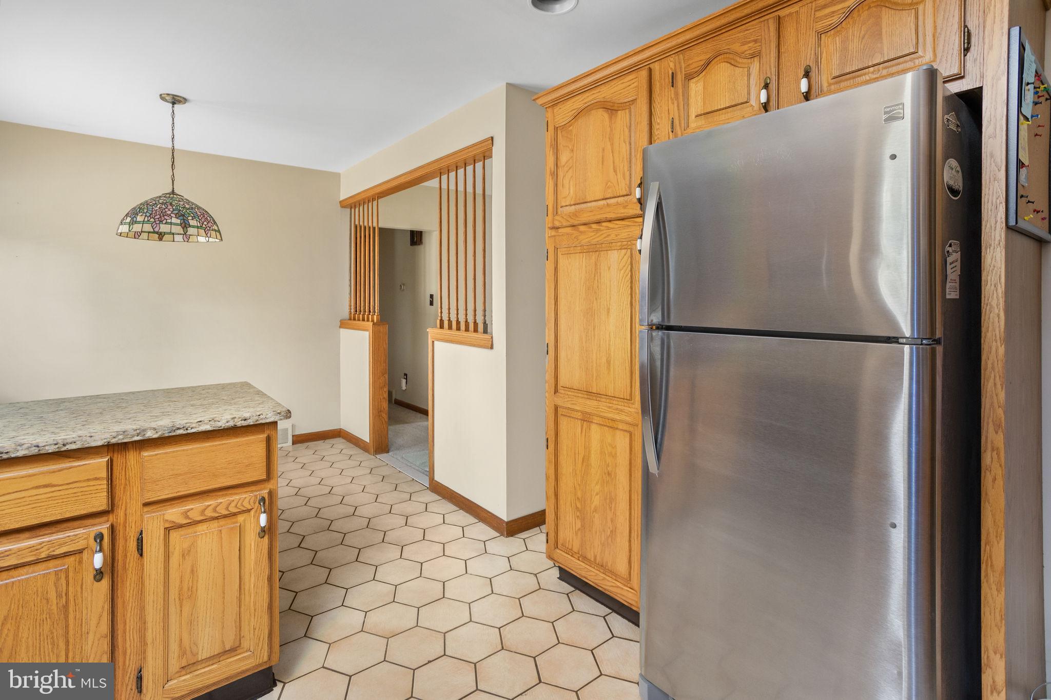 96 Bordentown Chesterfield Road Chesterfield, NJ 08515 - Photo 15 of 42 a white refrigerator freezer and a granite counter top
