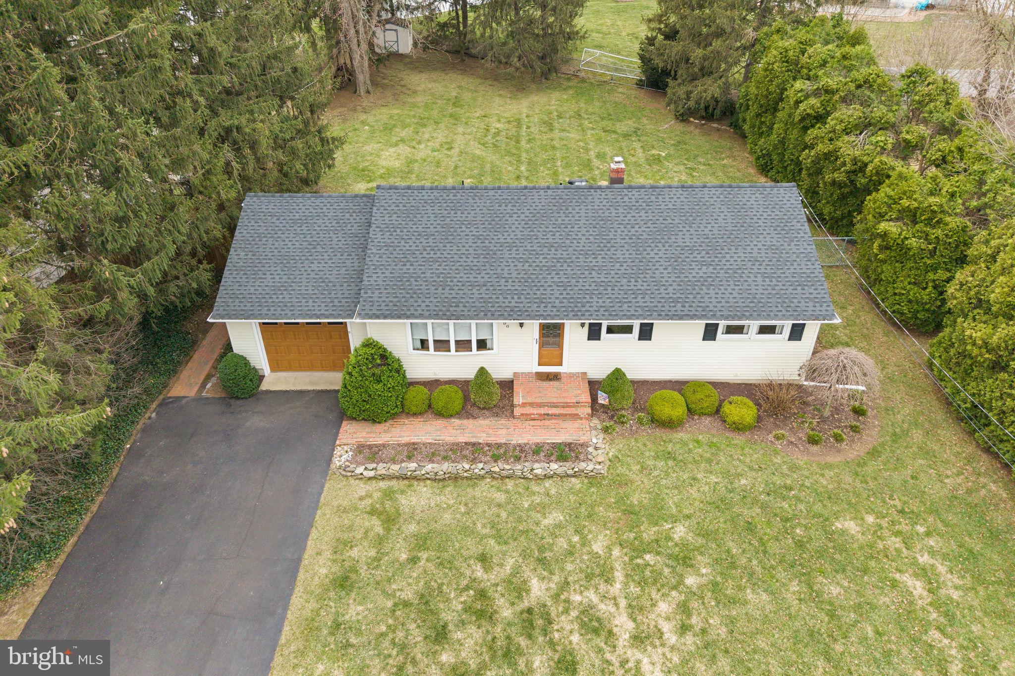 96 Bordentown Chesterfield Road Chesterfield, NJ 08515 - Photo 2 of 42 an aerial view of a house with swimming pool and big yard