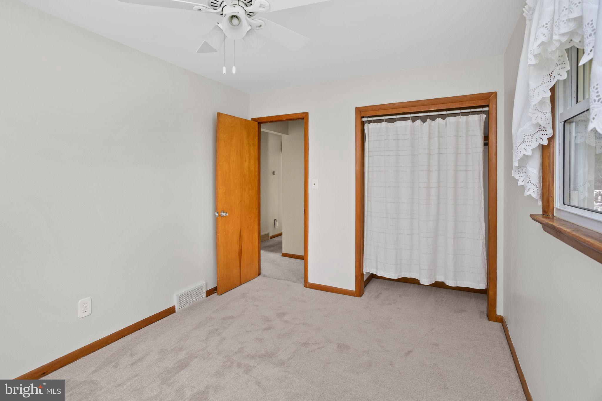 96 Bordentown Chesterfield Road Chesterfield, NJ 08515 - Photo 24 of 42 an empty room with windows and closet