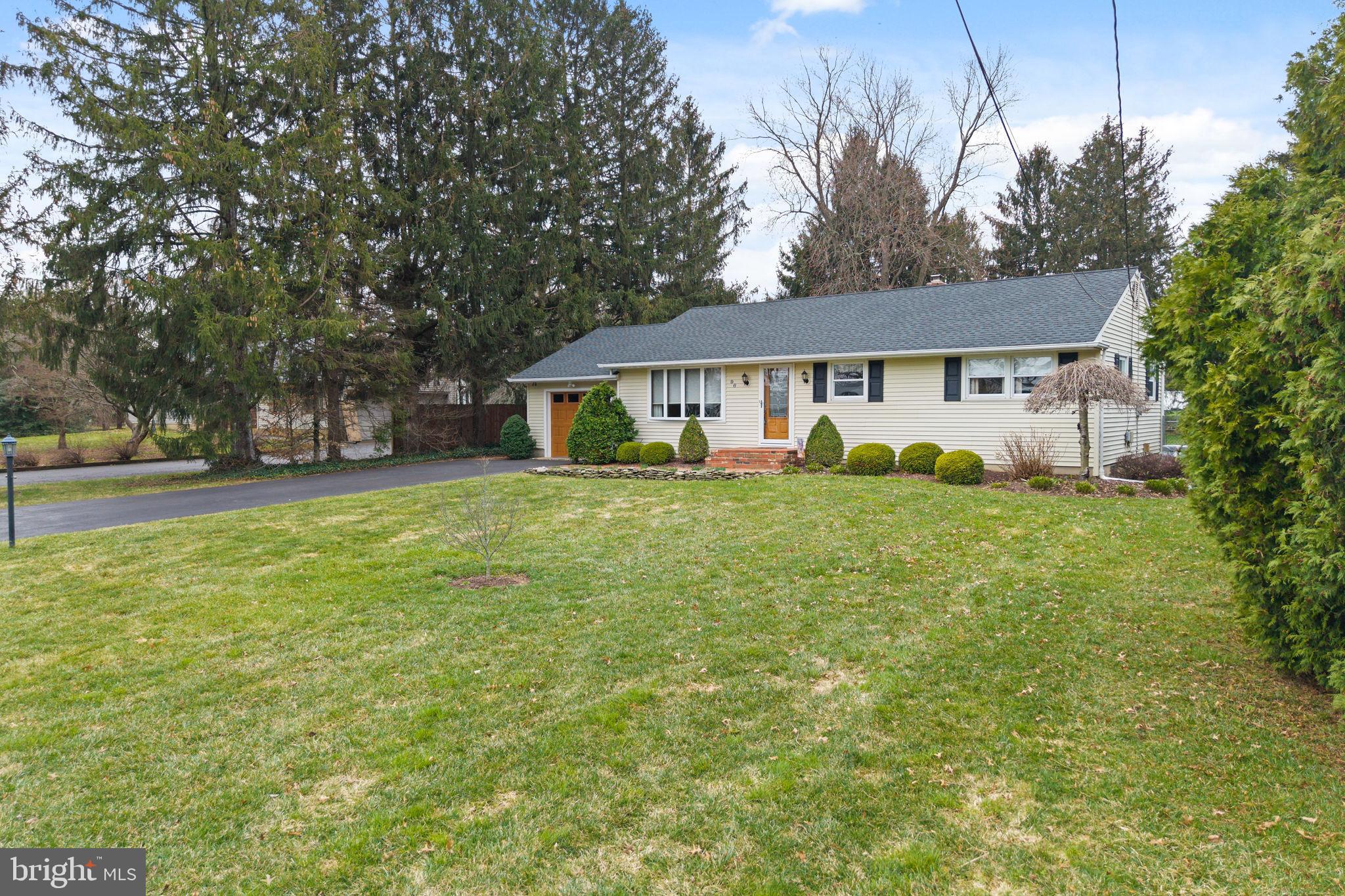 96 Bordentown Chesterfield Road Chesterfield, NJ 08515 - Photo 3 of 42 a view of a house with a big yard and large trees