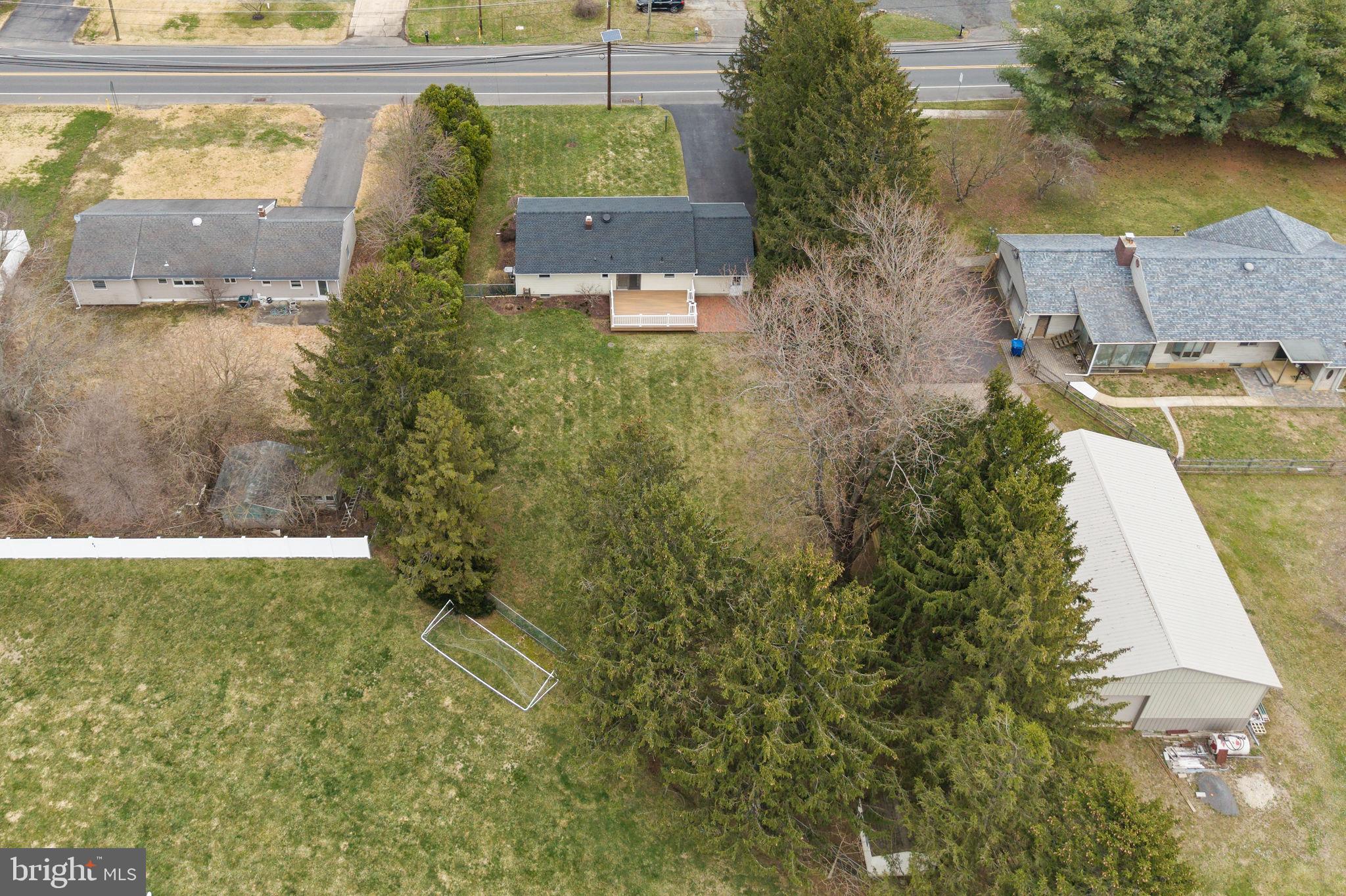 96 Bordentown Chesterfield Road Chesterfield, NJ 08515 - Photo 38 of 42 an aerial view of a house with a yard and lake view