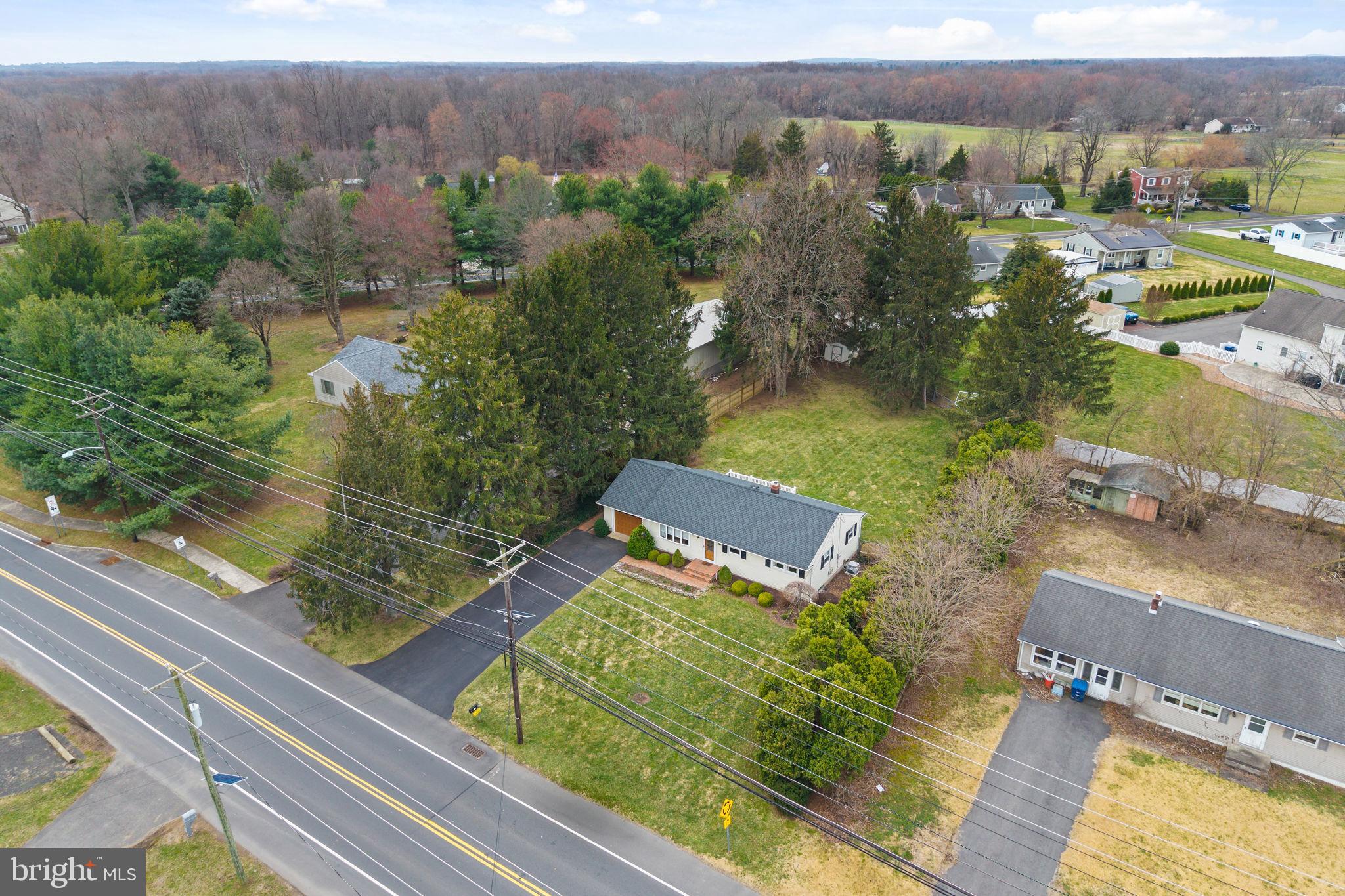 96 Bordentown Chesterfield Road Chesterfield, NJ 08515 - Photo 4 of 42 an aerial view of a house with a yard