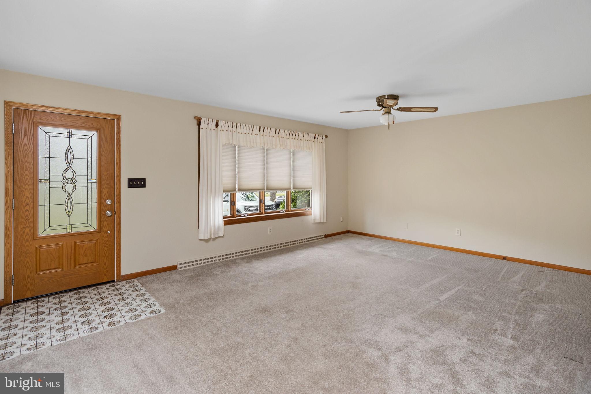 96 Bordentown Chesterfield Road Chesterfield, NJ 08515 - Photo 7 of 42 a view of an empty room with a window