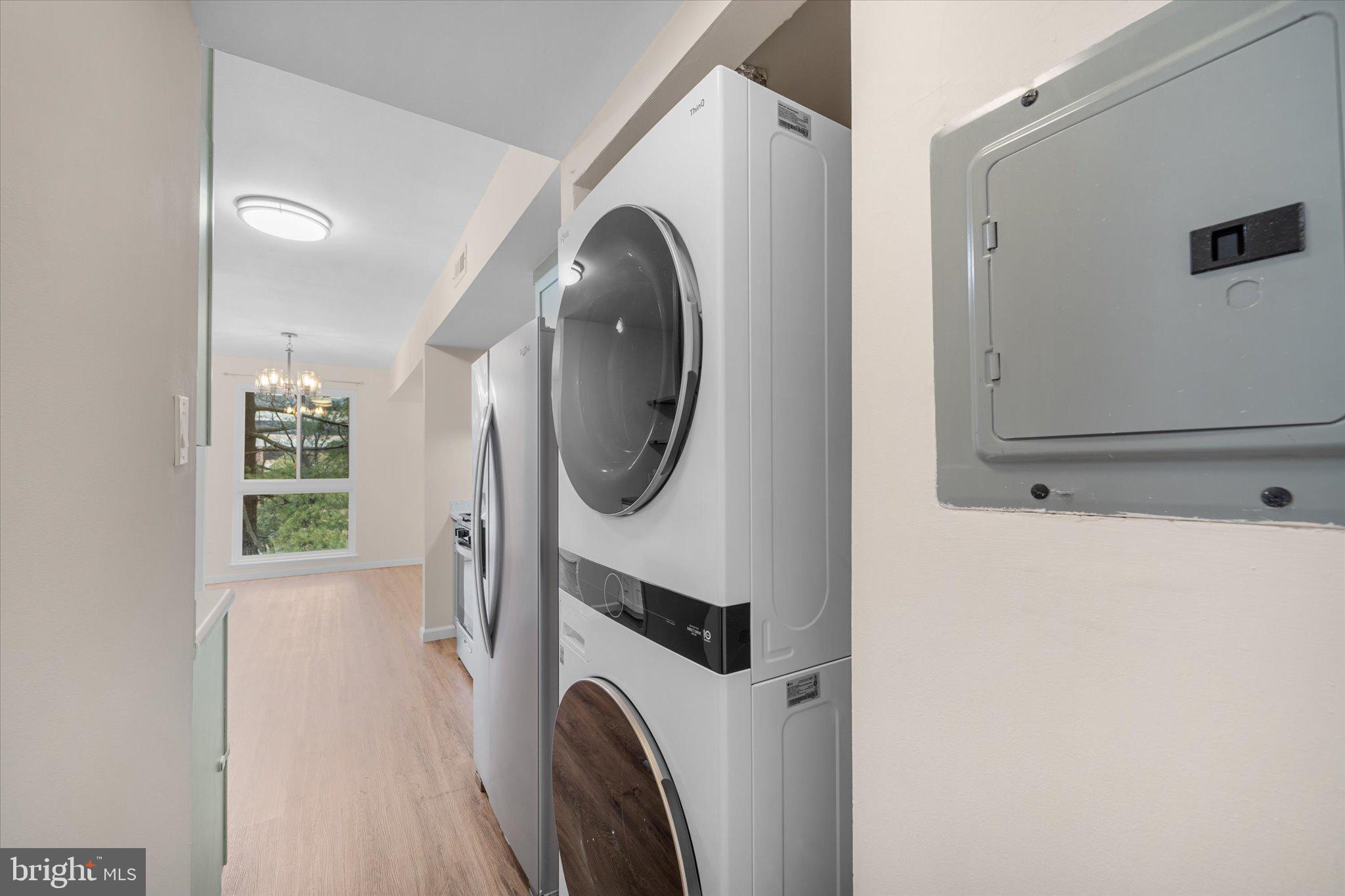 2073 Royal Fern Court, Unit 34/21B Reston, VA 20191 - Photo 12 of 25 a utility room with dryer and washer