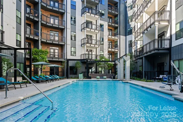 a view of a building with a swimming pool