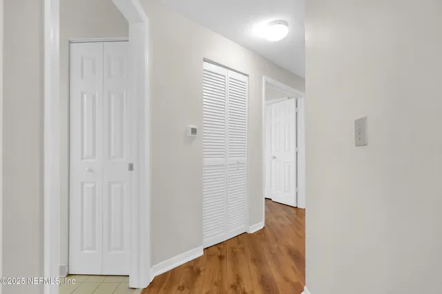 a view of a room with an entryway