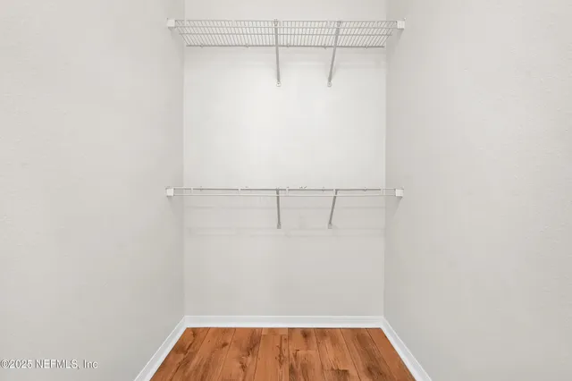 a view of a room with racks on the wall