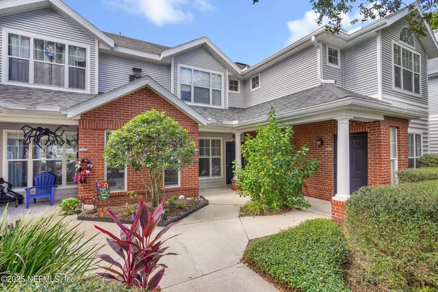 front view of a house with a small yard