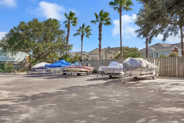 a group of cars parked in front of a house