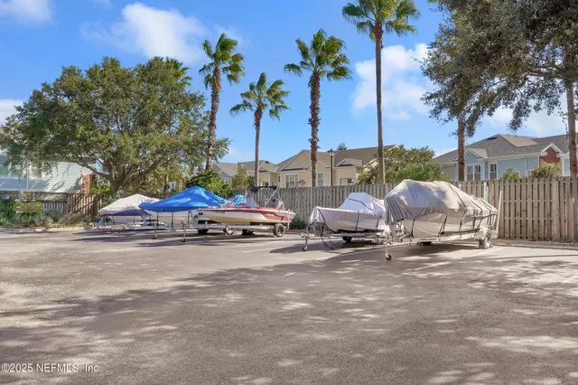 a group of cars parked in front of a house