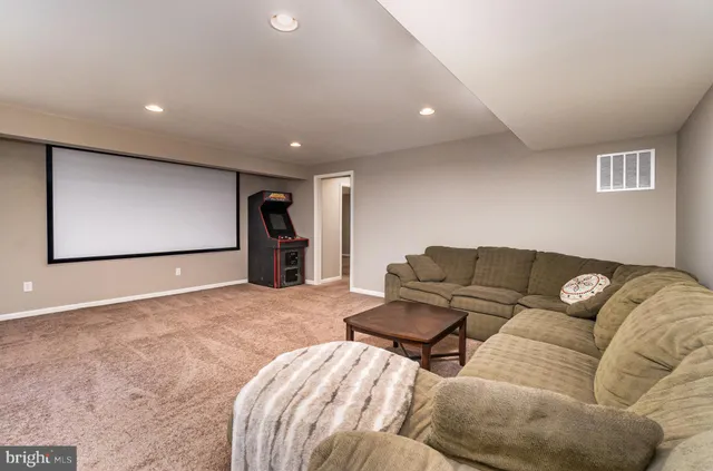 a view of a swimming pool with a yard