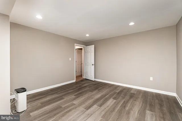 aerial view of a house with a yard