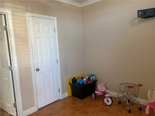 a room with toys and wooden floor
