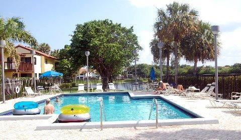 5831 Fox Hollow Drive, Unit C Boca Raton, FL 33486 - Photo 35 of 38 villagepool2.croppedJPG