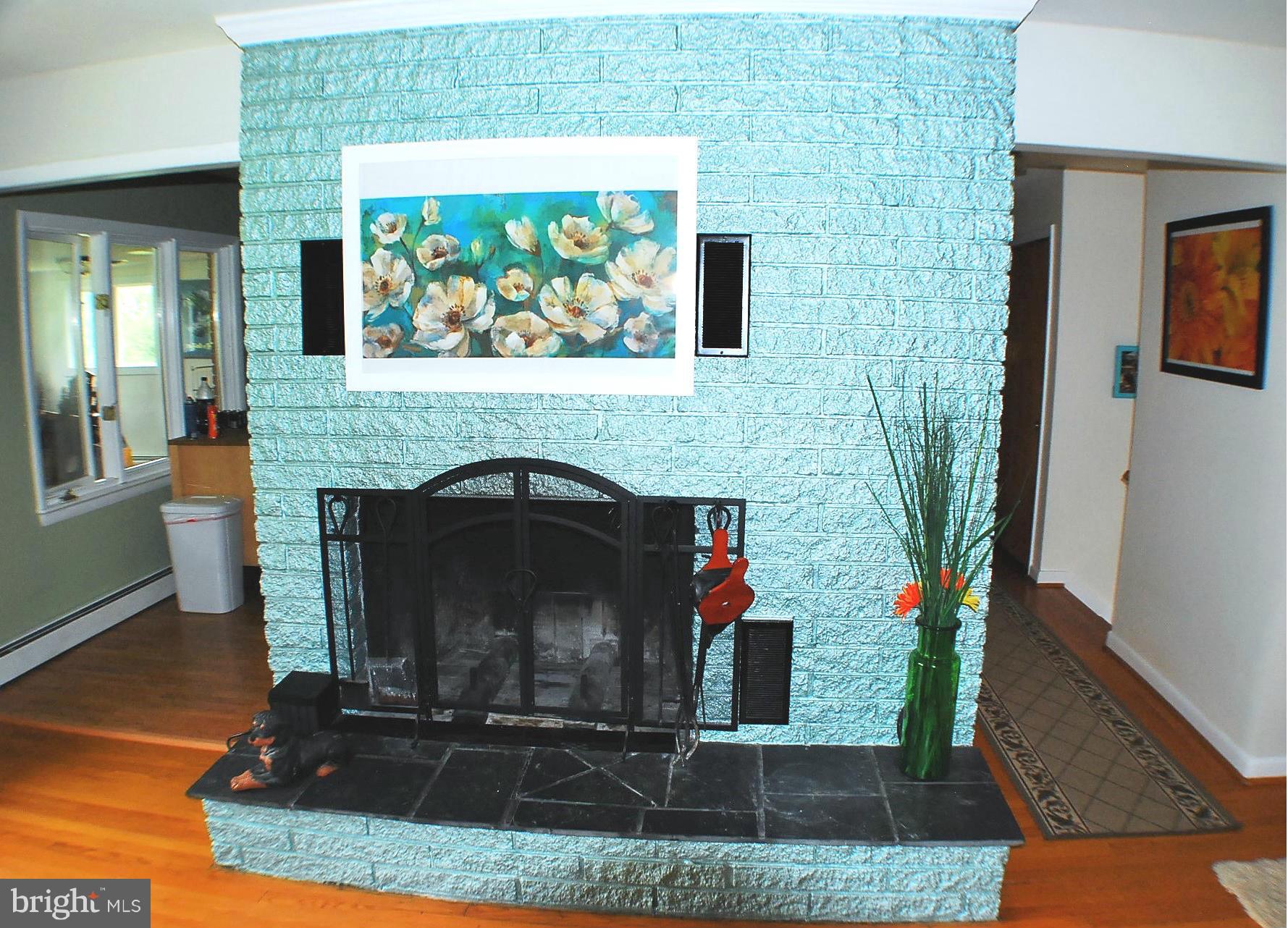 7995 Summit Point Road Charles Town, WV 25414 - Photo 11 of 30 Living Room Wood burning Fireplace