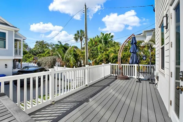 a view of a chairs on the deck