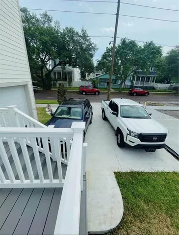 a car parked in front of a house