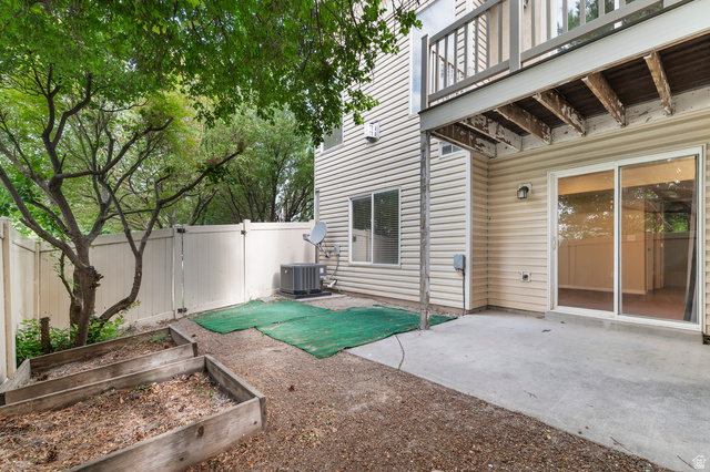 3053 Sage Loop, Unit B1 Lehi, UT 84043 - Photo 23 of 25 Rear patio with sliding glass door access