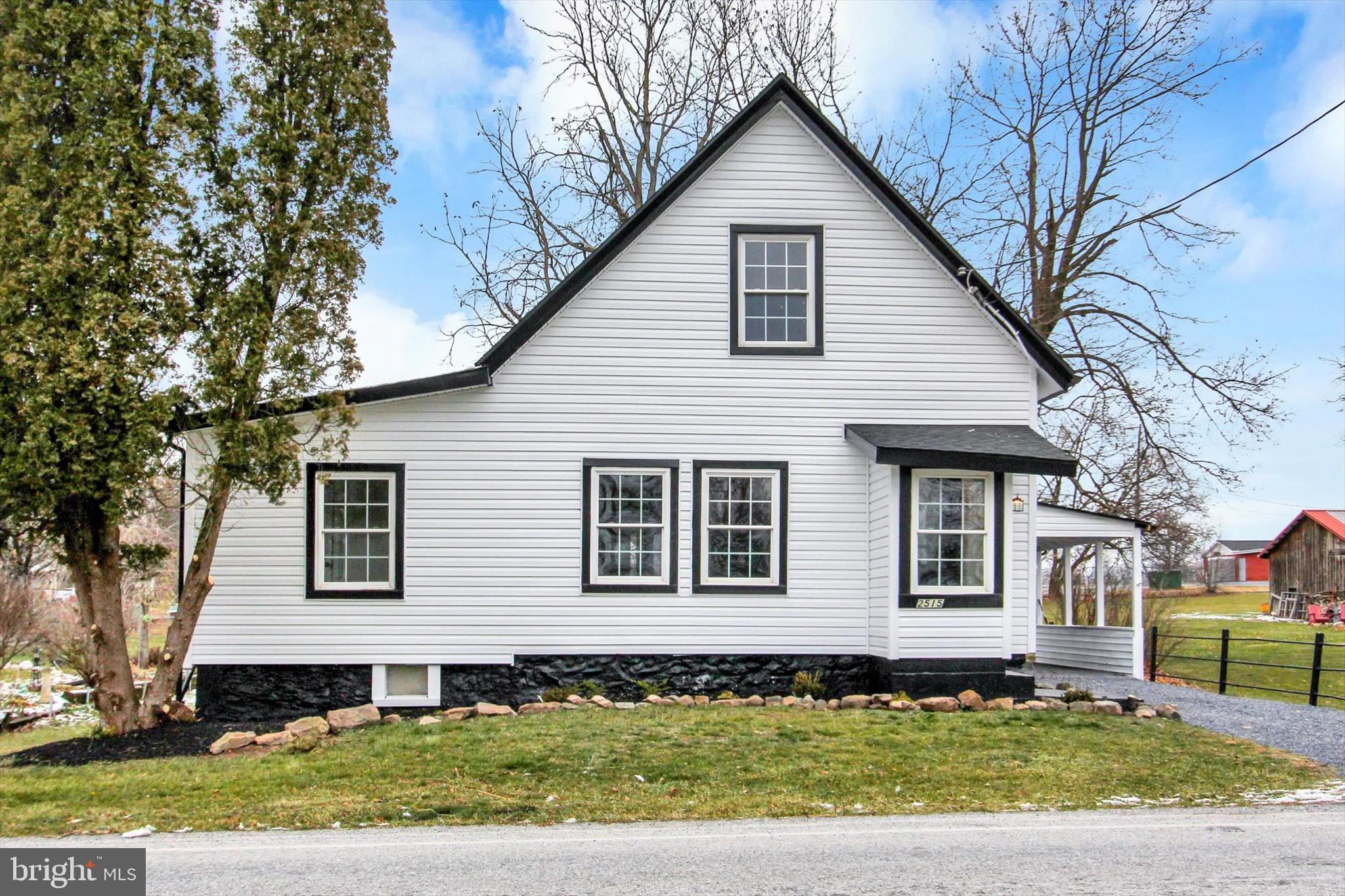2515 Mummasburg Road Gettysburg, PA 17325 - Photo 22 of 22 a front view of a house with a yard