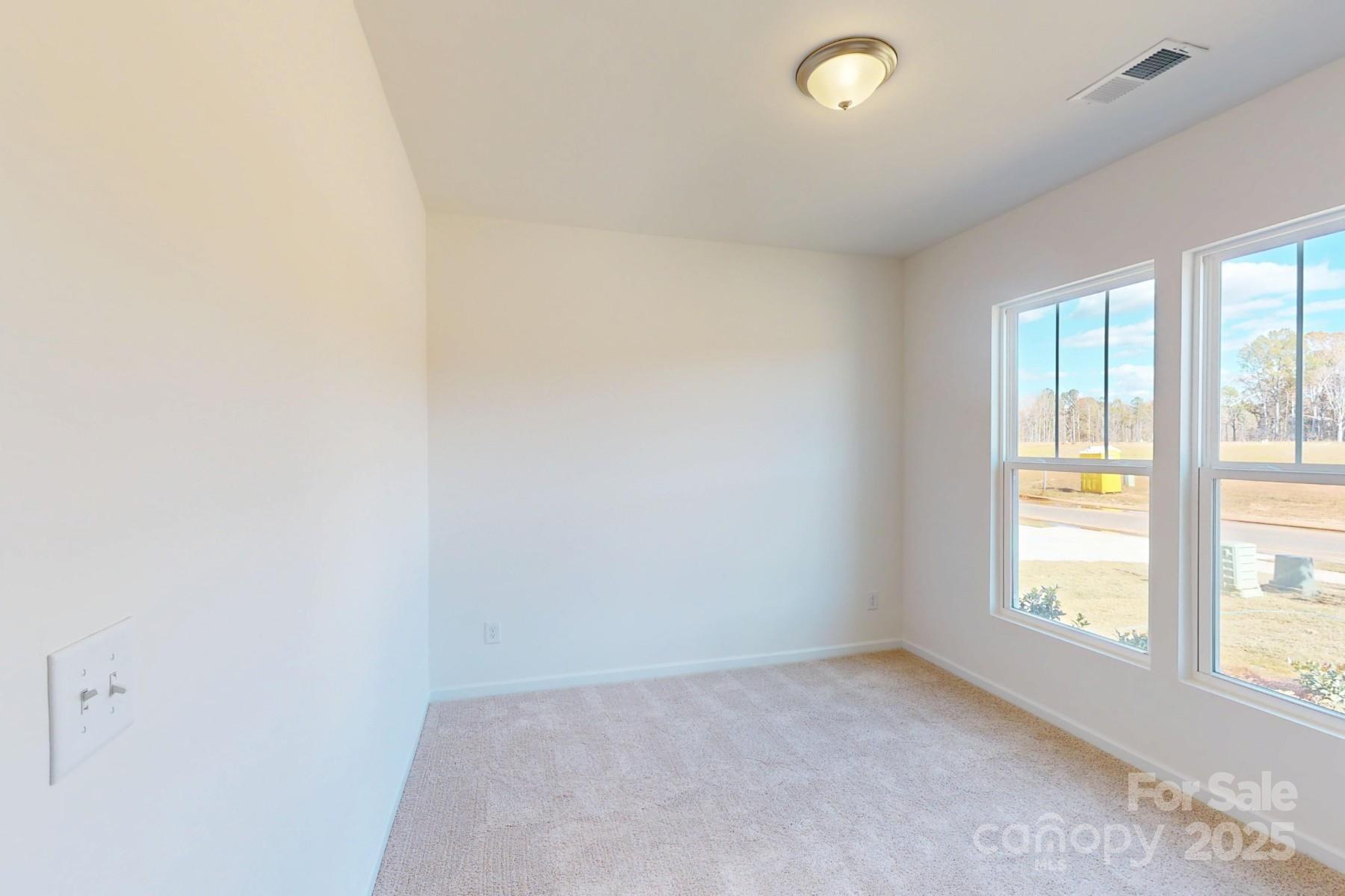 1494 Kate Cecil Way York, SC 29745 - Photo 15 of 20 an empty room with windows