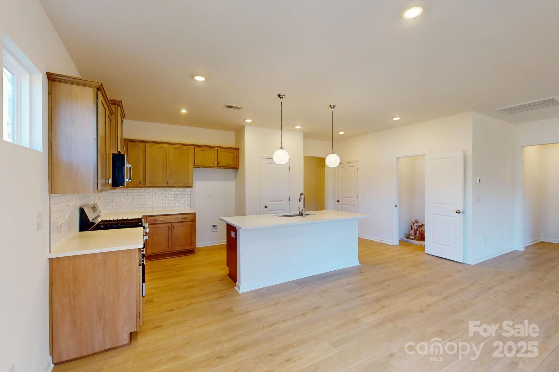 1494 Kate Cecil Way York, SC 29745 - Photo 5 of 20 a large white kitchen with a large window