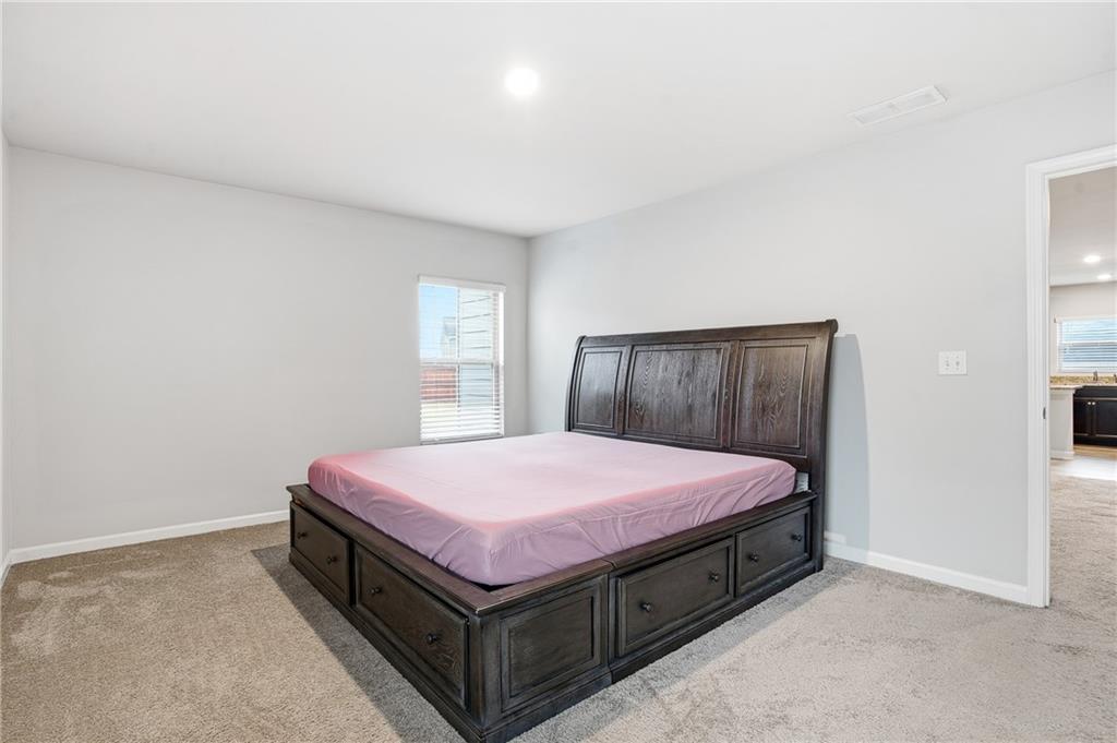 6968 New Dale Road Rex, GA 30273 - Photo 34 of 47 a room with a bed and window