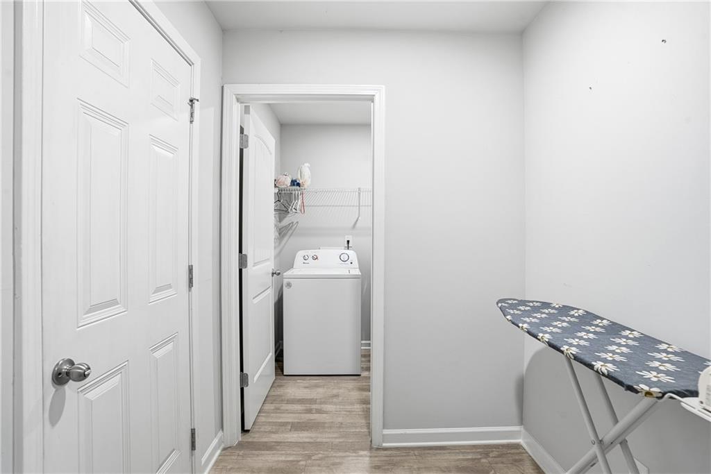 6968 New Dale Road Rex, GA 30273 - Photo 38 of 47 a view of a bathroom from a hallway