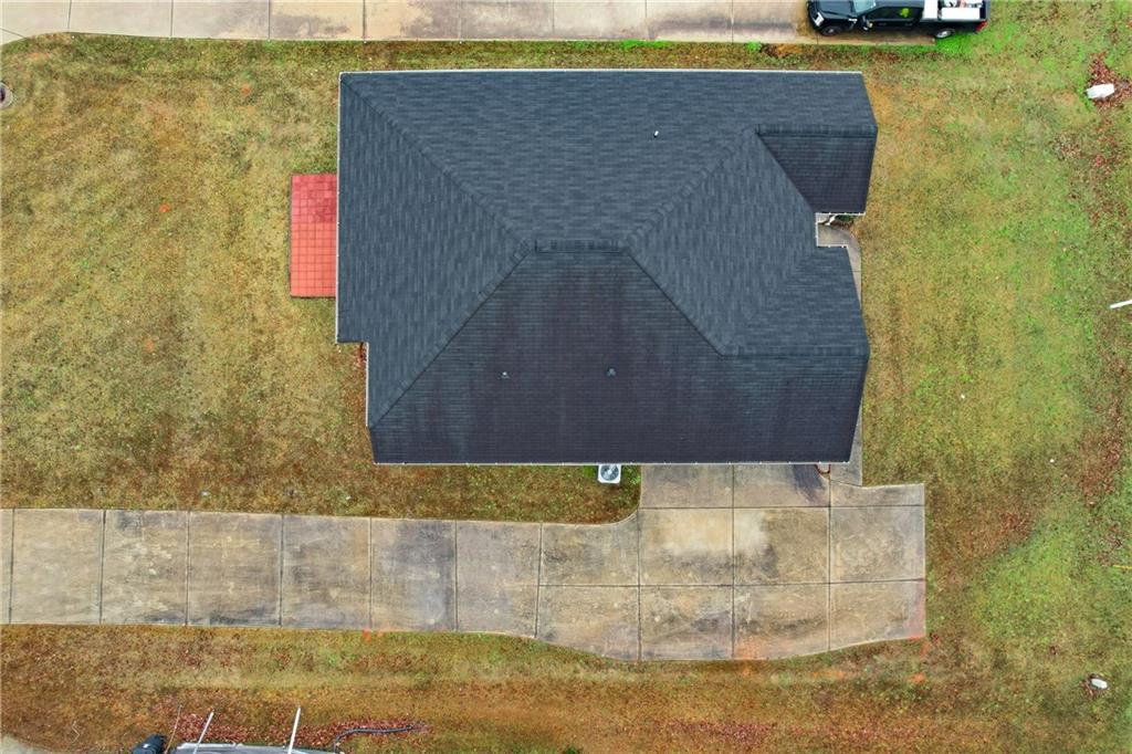 6968 New Dale Road Rex, GA 30273 - Photo 42 of 47 a bathroom with a granite countertop sink and mirror