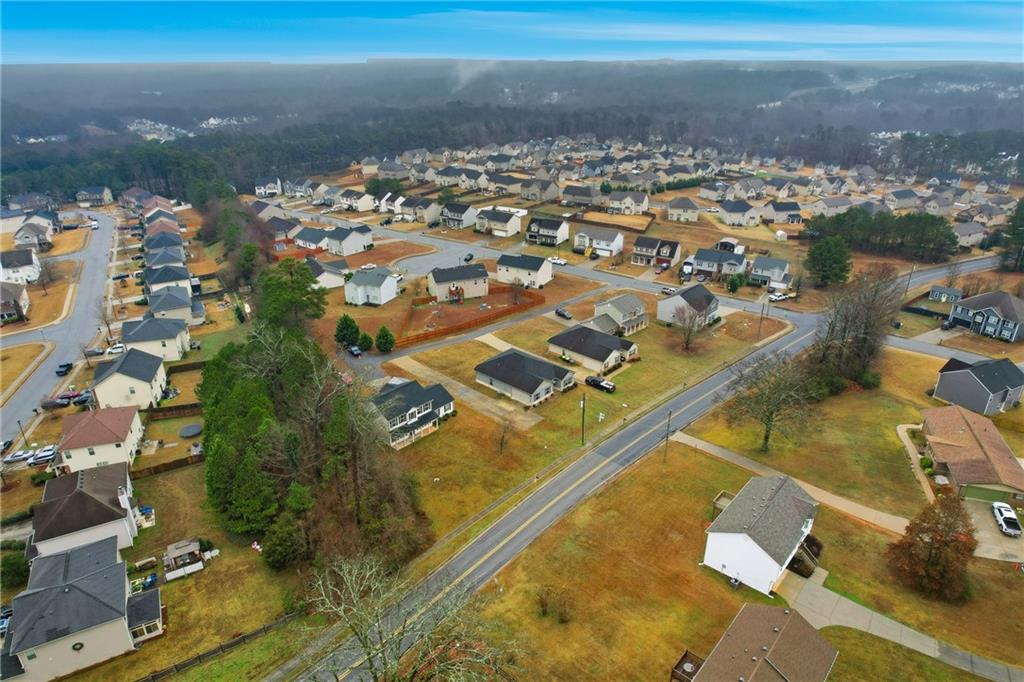 6968 New Dale Road Rex, GA 30273 - Photo 46 of 47 an aerial view of residential houses with outdoor space