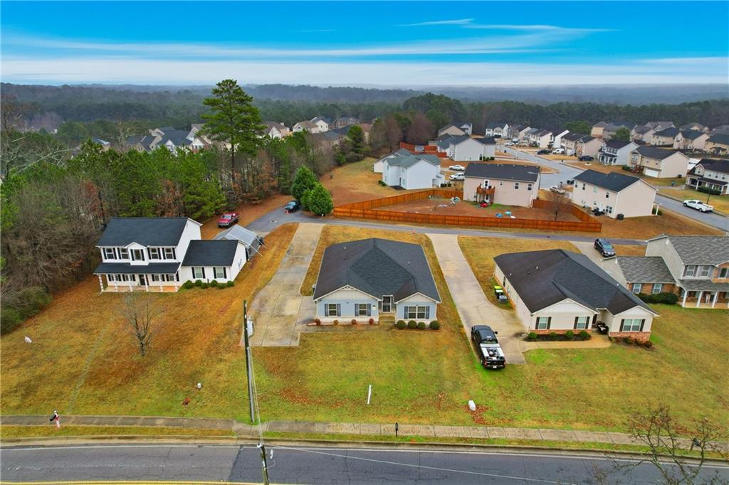 6968 New Dale Road Rex, GA 30273 - Photo 47 of 47 an aerial view of a house with a ocean view