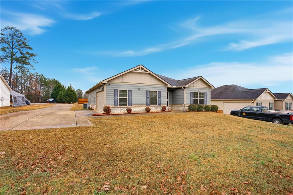 6968 New Dale Road Rex, GA 30273 - Photo 5 of 47 a view of a house with a yard and sitting area