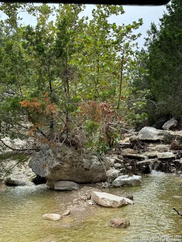 a view of swimming pool from a lake