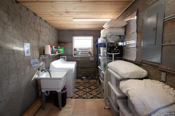 a bathroom with a sink and a shower