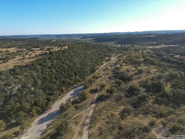 a view of a back yard of the house