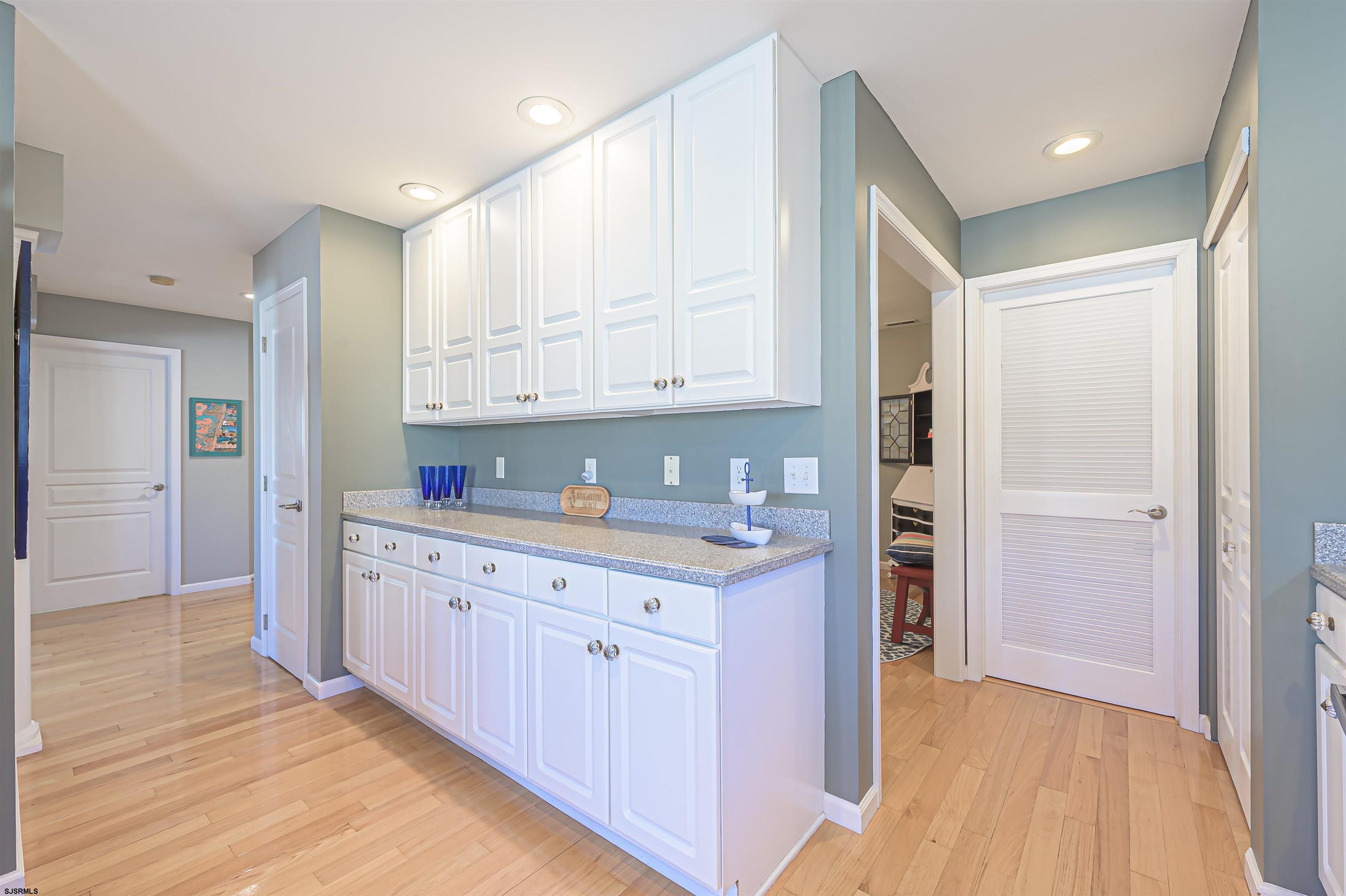 201 25th Street South Brigantine, NJ 08203 - Photo 16 of 44 a kitchen with granite countertop a stove and a refrigerator