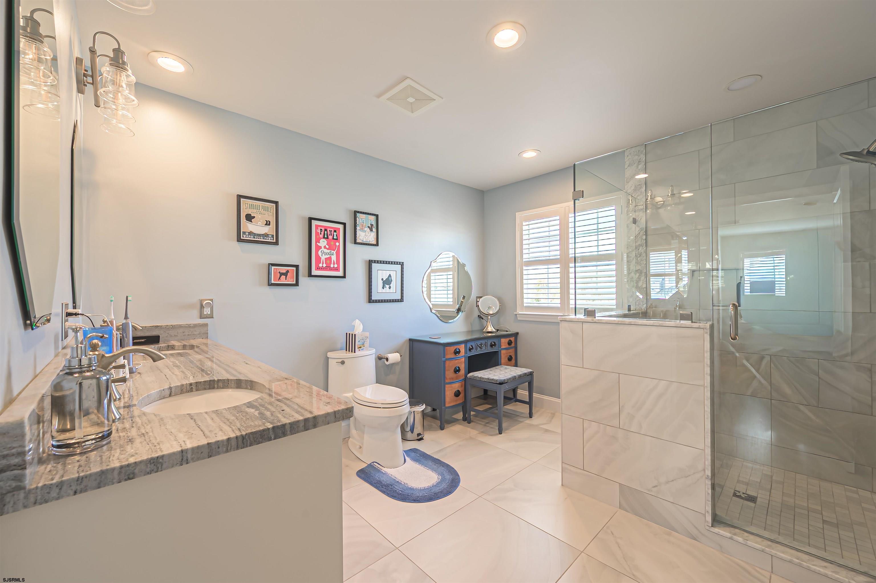201 25th Street South Brigantine, NJ 08203 - Photo 26 of 44 a living room with granite countertop furniture and a table
