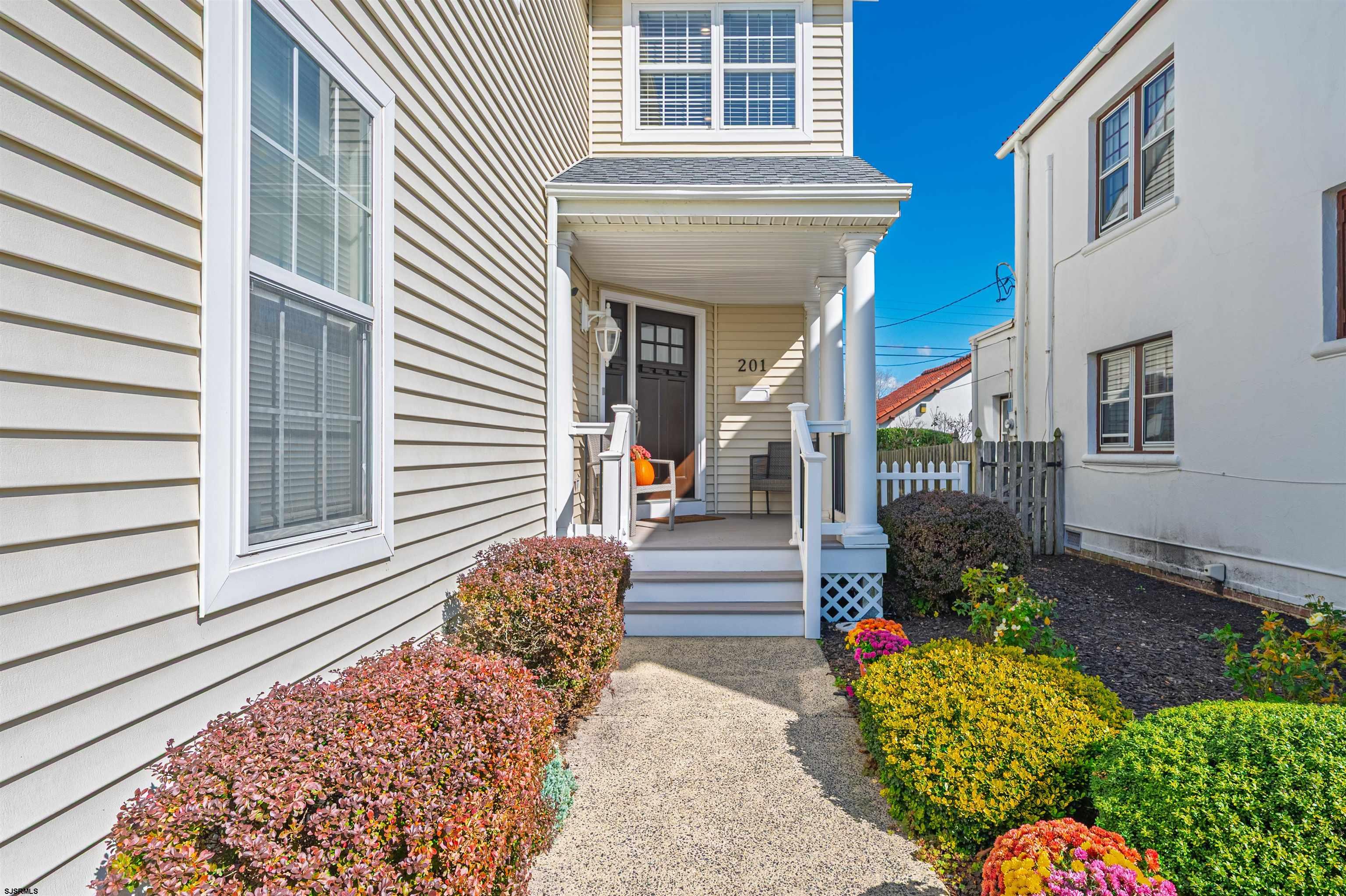 201 25th Street South Brigantine, NJ 08203 - Photo 3 of 44 a front view of a house