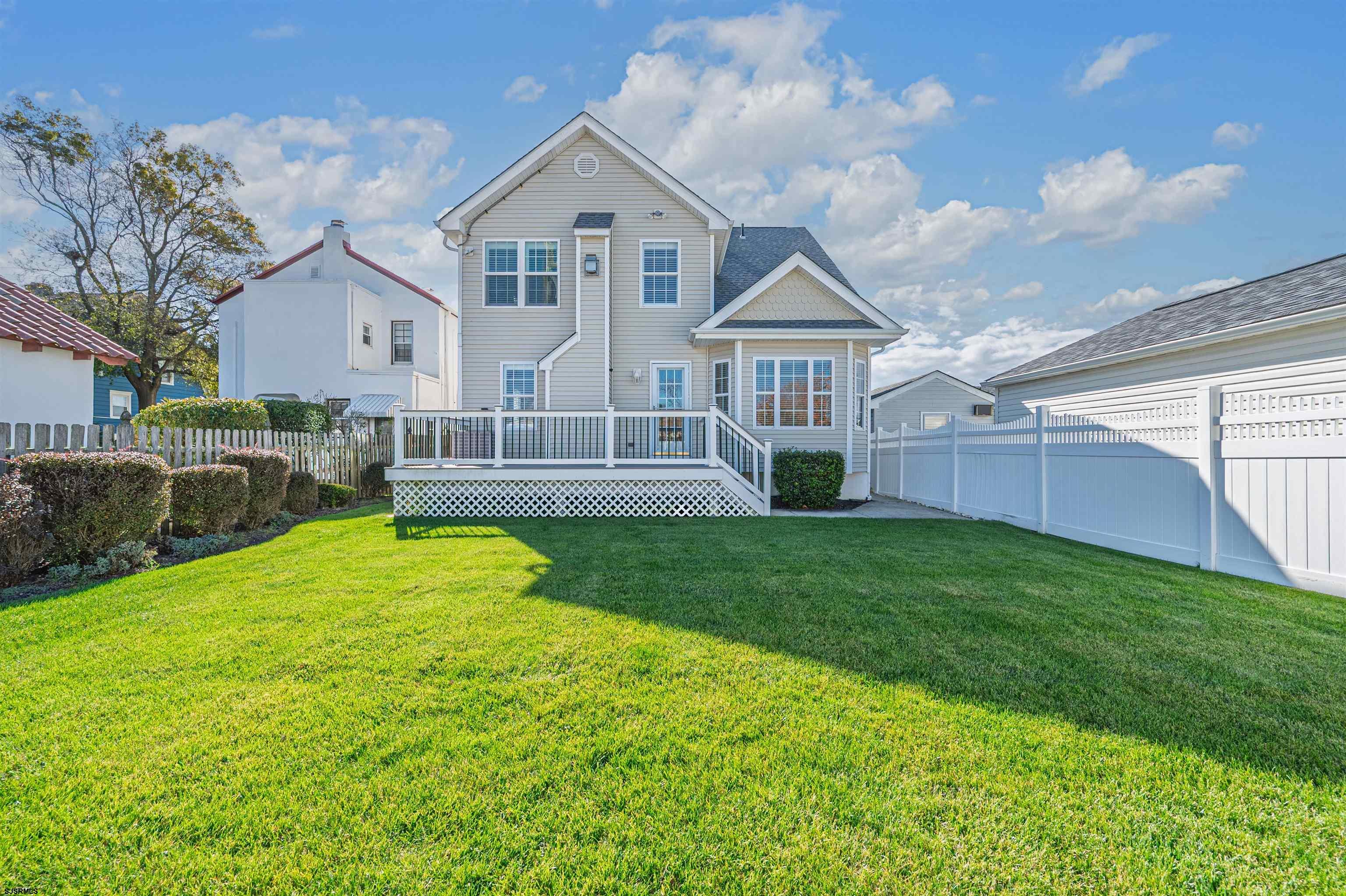 201 25th Street South Brigantine, NJ 08203 - Photo 33 of 44 a view of a house with a yard