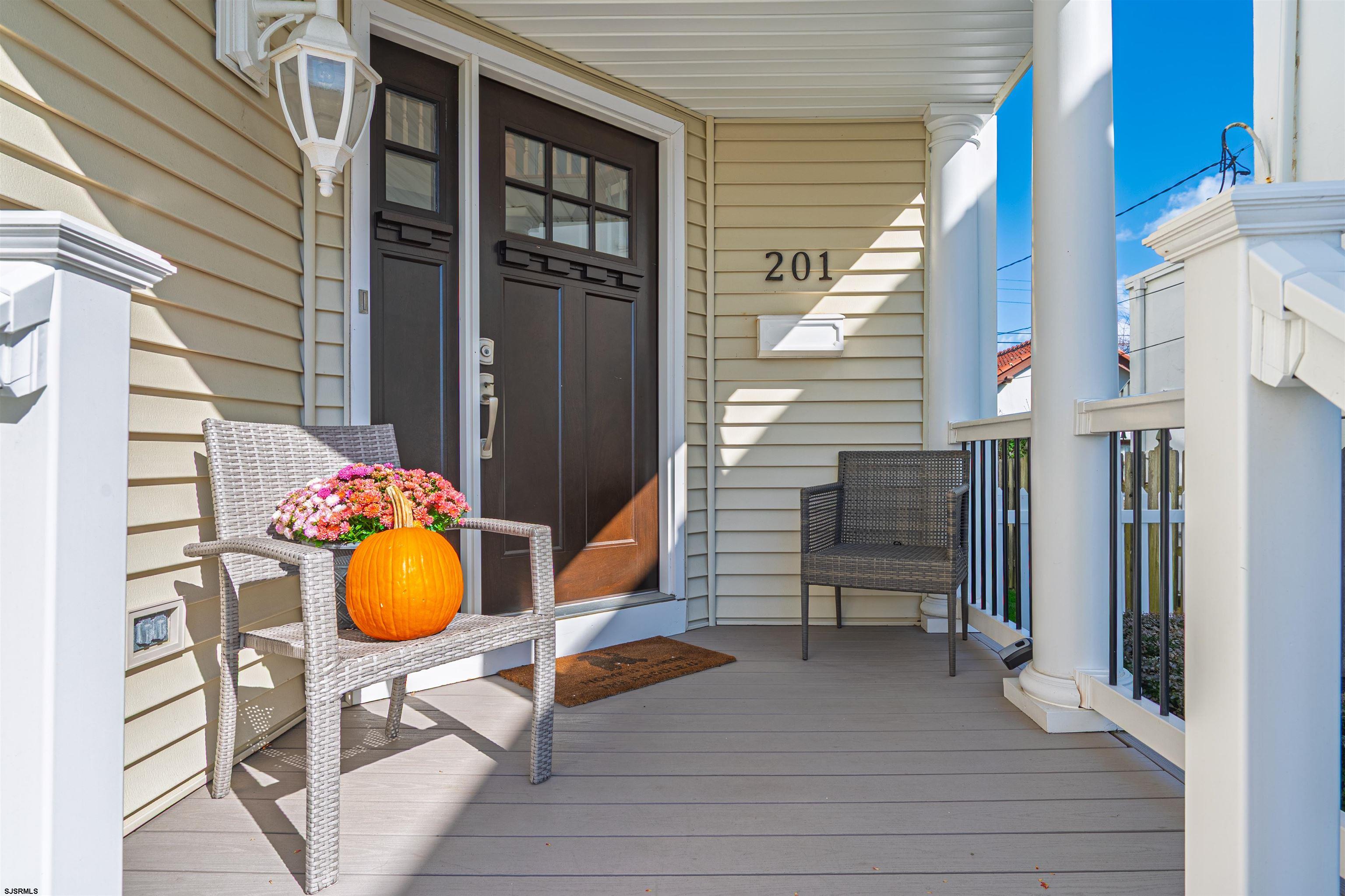 201 25th Street South Brigantine, NJ 08203 - Photo 4 of 44 a view of a wooden house and a entrance