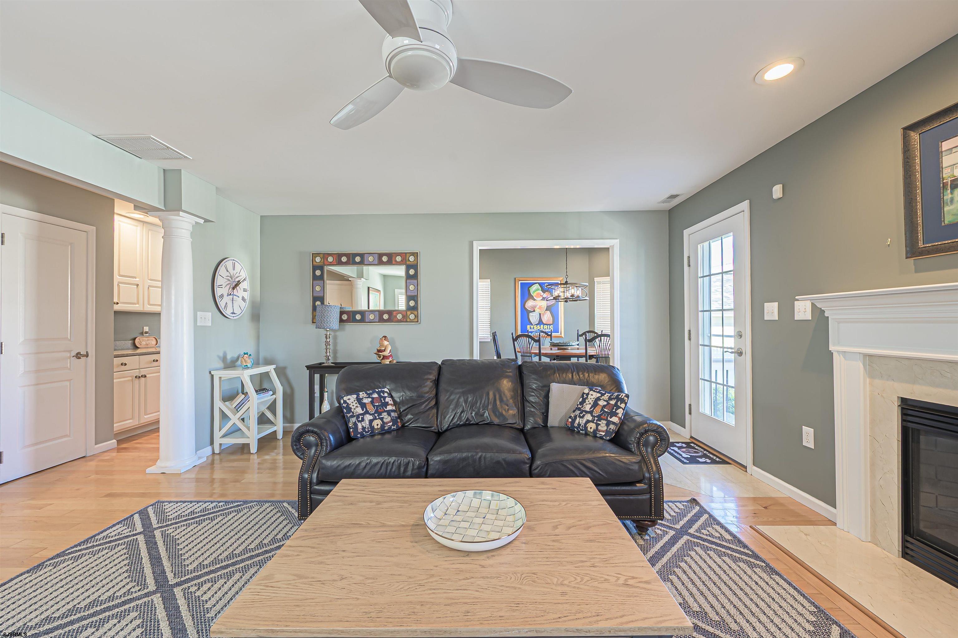201 25th Street South Brigantine, NJ 08203 - Photo 10 of 44 a living room with furniture and a fireplace