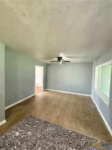 an empty room with a natural light