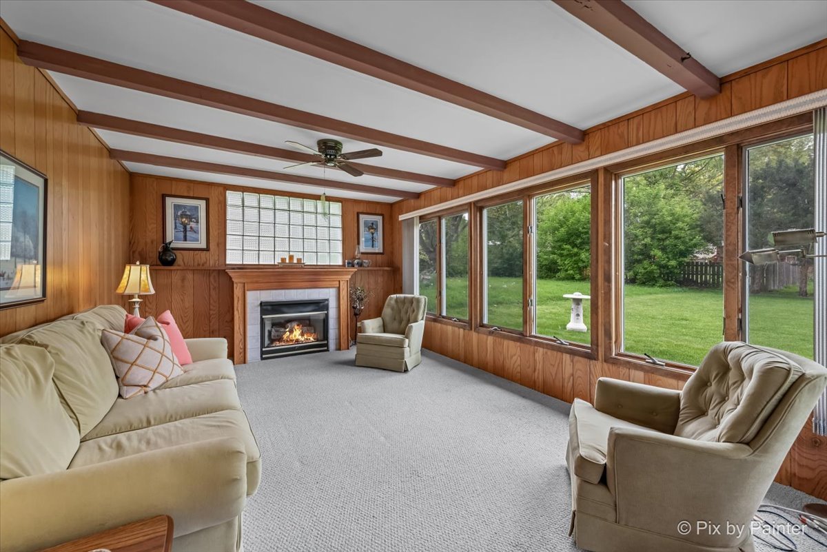 425 Summit Street Algonquin, IL 60102 - Photo 15 of 43 a living room with furniture and a fireplace