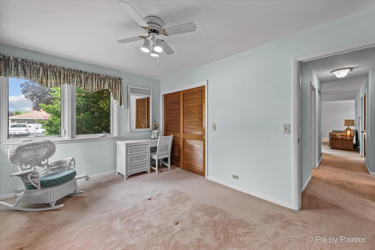 425 Summit Street Algonquin, IL 60102 - Photo 17 of 43 a view of livingroom with furniture window and a ceiling fan