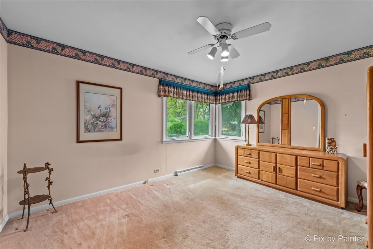 425 Summit Street Algonquin, IL 60102 - Photo 18 of 43 a view of room with window and ceiling fan