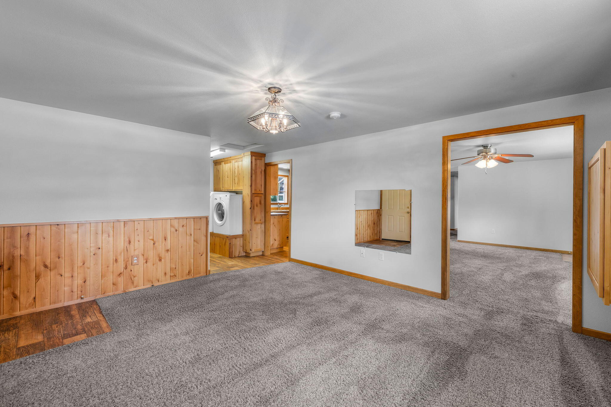 22818 McGrath Road Bend, OR 97701 - Photo 15 of 57 Family Room open to Living Room and Laundry area