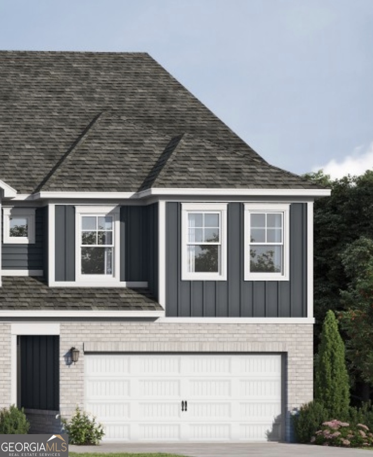 2280 Santa Fe Street, Unit 17 Morrow, GA 30260 - Photo 2 of 19 a front view of a house with a yard