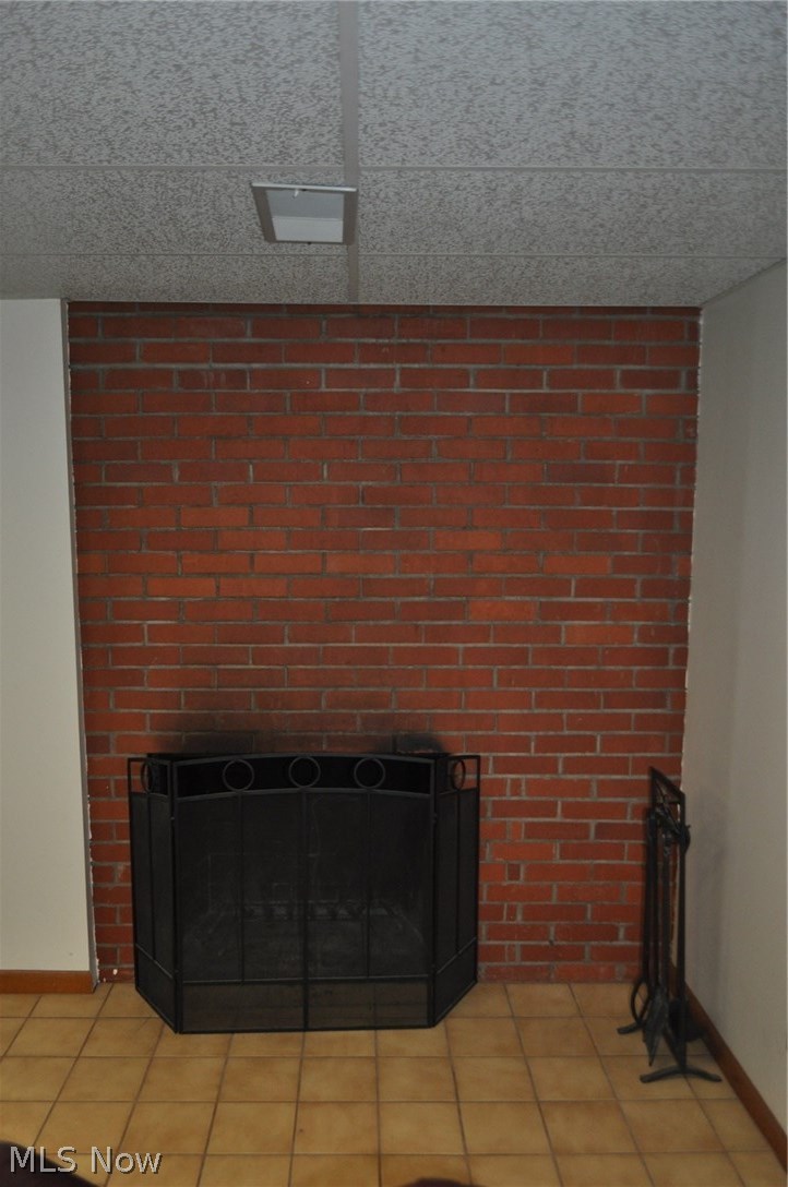 3060 Dresden Road Zanesville, OH 43701 - Photo 25 of 34 Wood burning fireplace in lower level family room to enjoy during winter months