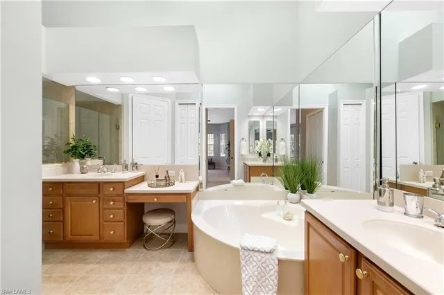 a bathroom with a double vanity sink and a mirror