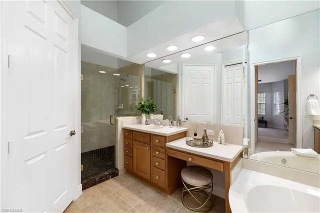 a bathroom with a sink double vanity and a mirror