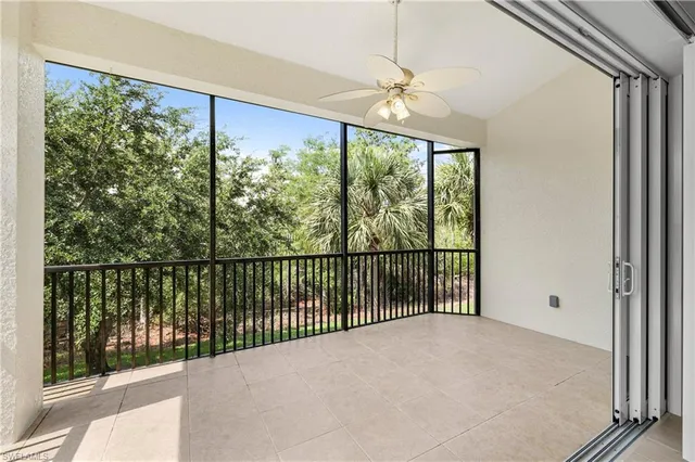 a view of a balcony with furniture
